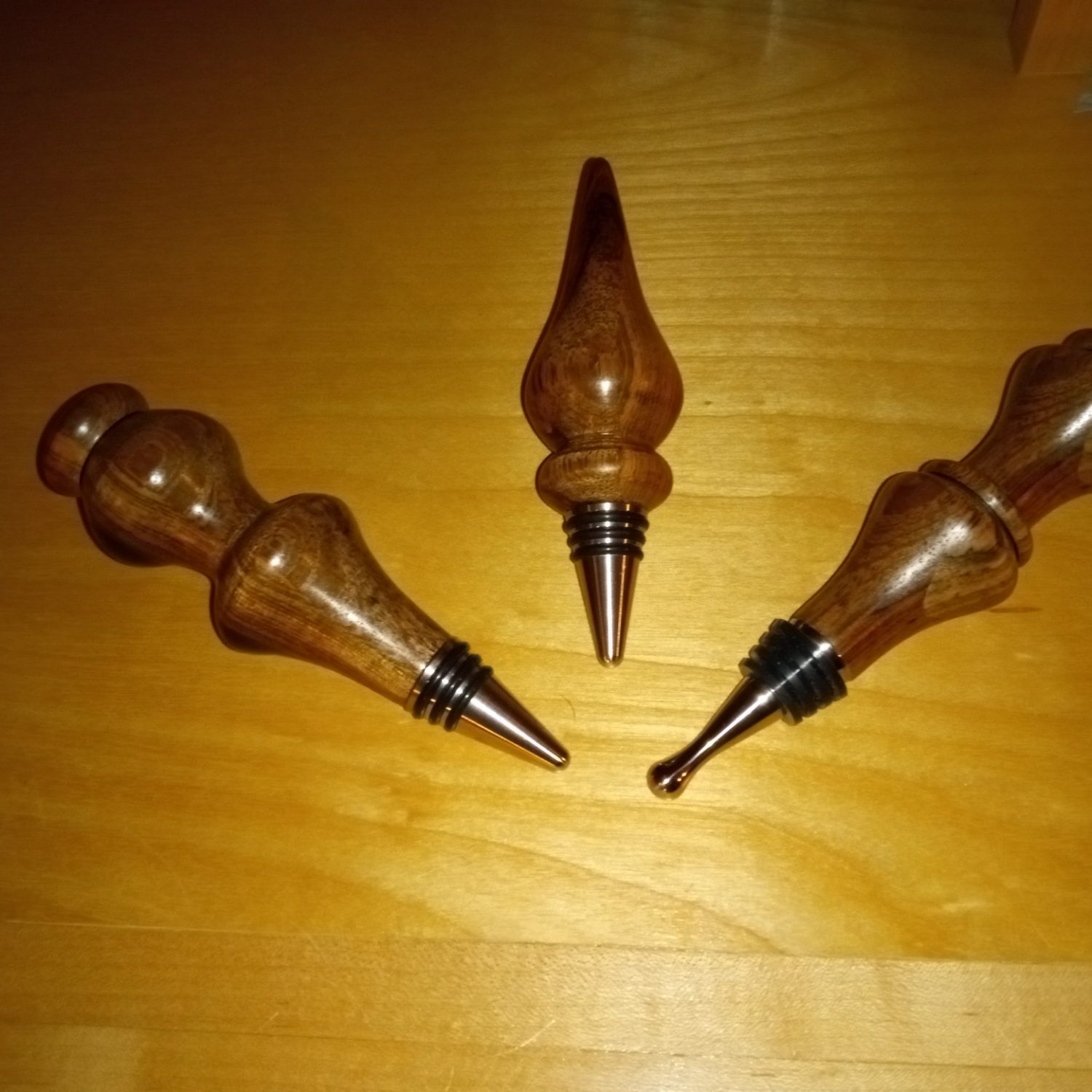 A group of turned wine and whiskey bottle stoppers